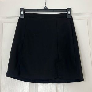 black mini skirt/skort